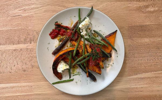 Roasted Red Kuri Squash with Spices, Tomato and Goat Cheese